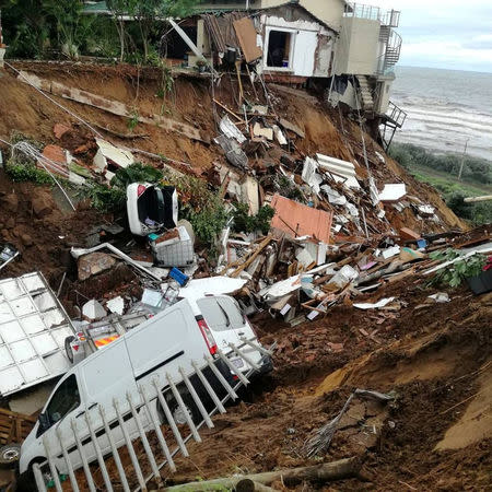 Vehicles and debris are scattered after massive flooding in Amanzimtoti, near Durban, South Africa April 23, 2019 in this picture obtained from social media on April 24, 2019. Gavin Welsh via REUTERS