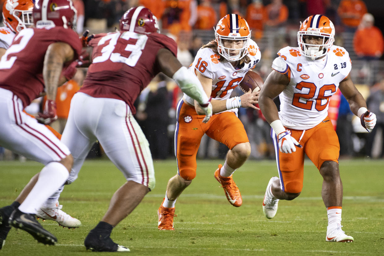 SANTA CLARA, CA - JANUARY 07: Trevor Lawrence #16 of the Clemson Tigers rushes against the Alabama Crimson Tide during the College Football Playoff National Championship held at Levi's Stadium on January 7, 2019 in Santa Clara, California. The Clemson Tigers defeated the Alabama Crimson Tide 44-16. (Photo by Jamie Schwaberow/Getty Images)