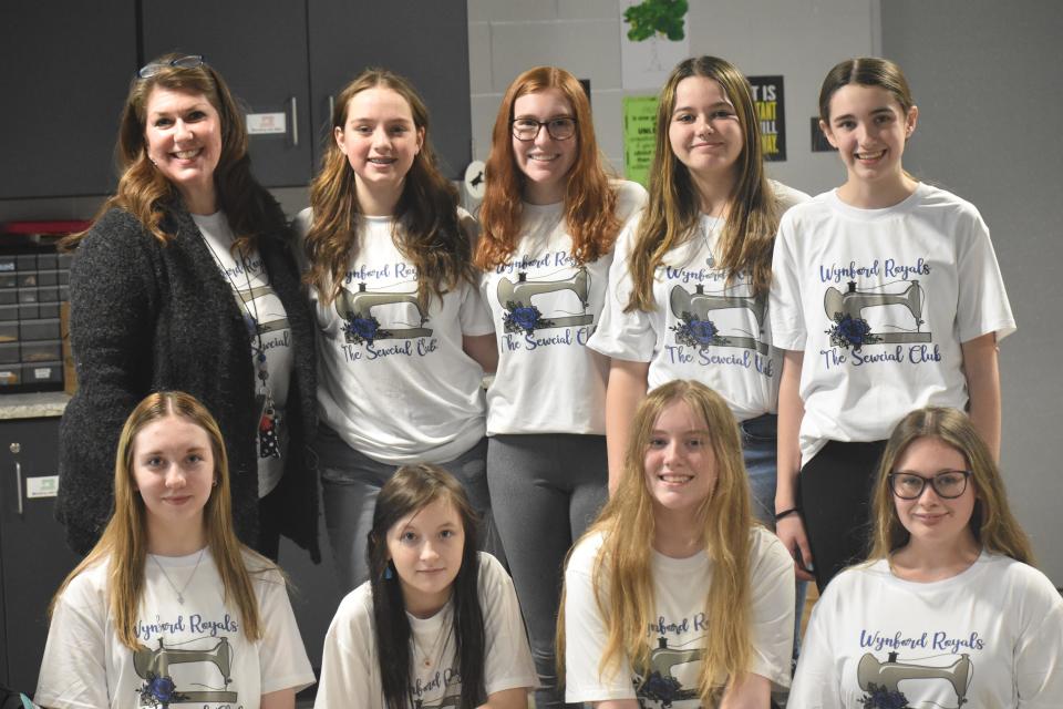 Rachel Stucky, back left, Brianna Brown, Addison Pelter, Karlee Dowell, Breylee Clark, Emma Goldy, front left,, Allison Eulett, Lillian York and Haley Martin make up this year's Sewcial Club.