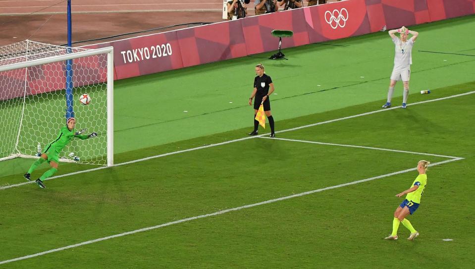 Sweden's Caroline Seger launches a penalty kick over the crossbar.