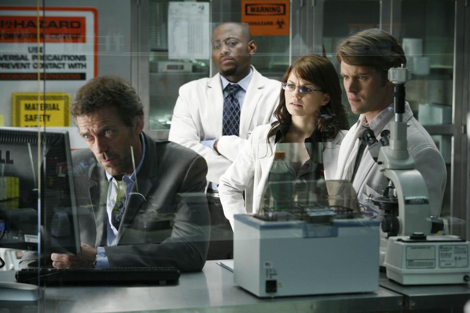 In this image released by Fox, from left, Hugh Laurie, Omar Epps, Jennifer Morrison and Jesse Spencer are shown in a scene from the third season of "House, M.D." The Fox medical drama concludes its eight-season run on Monday, May 21, 2012, with a finale at 9 p.m. EDT, preceded by a one-hour retrospective. (AP Photo/Fox, Greg, Gayne)