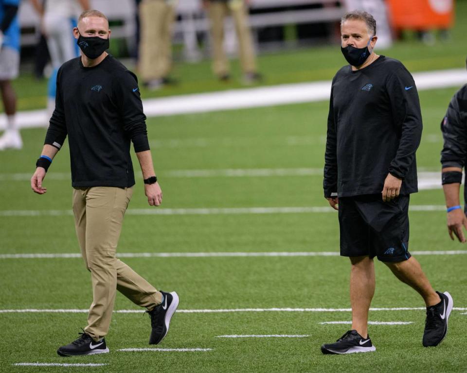 Carolina Panthers offensive coordinator Joe Brady walks with Carolina Panthers head coach Matt Rhule at the Mercedes-Benz Superdome on Sunday, October 25, 2020, in New Orleans.