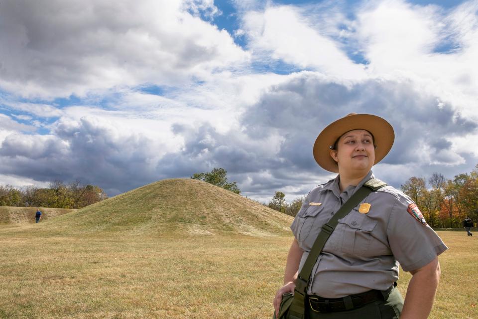 National Parks Service Ranger, Hailey M. Senediak, stands amongst the mounds at the Hopewell Culture National Historical Park educating visitors about the earthworks, Hopewell culture and indigenous peoples before the start of the Hopewell Ceremonial Earthworks UNESCO World Heritage Inscription on October 14, 2023, in Chillicothe, Ohio.