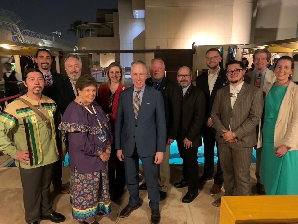 The Ohio delegation at the UNESCO World Heritage Committee meeting in Saudi Arabia, where the Newark Earthworks sites were named to the prestigious World Heritage List. From left, they are: Joe Stahlman, Seneca Nation; Josh Garcia, Wyandotte Nation; Kevin Pape, World Heritage Ohio Ambassador; Chief Glenna Wallace, Eastern Shawnee Tribe of Oklahoma; Megan Wood, executive director and CEO, Ohio History Connection; Ambassador Michael Ratney from the U.S. Embassy; Chris Alford, superintendent, Hopewell Culture National Historical Park; Bret Ruby, archeologist and chief of resource management, Hopewell Culture National Historical Park; Alex Wesaw, director of American Indian Relations Division, Ohio History Connection, and Pokagon Band of Potawatomi Indians; Logan York, Miami Nation; Brad Lepper, senior archaeologist, Ohio History Connection World Heritage Program; and Jennifer Aultman, chief historic sites officer, Ohio History Connection. Not pictured is Jerry Dannemiller, chief marketing officer, Ohio History Connection., who took the photo.