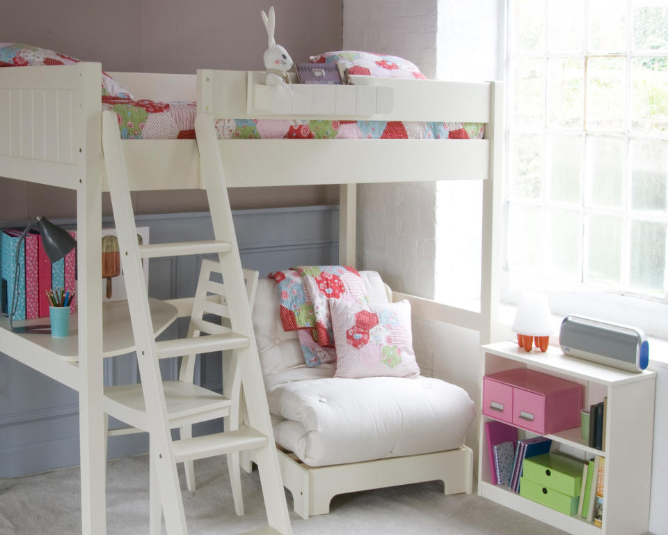 23. Utilize all levels with a loft bed in a kids's bedroom