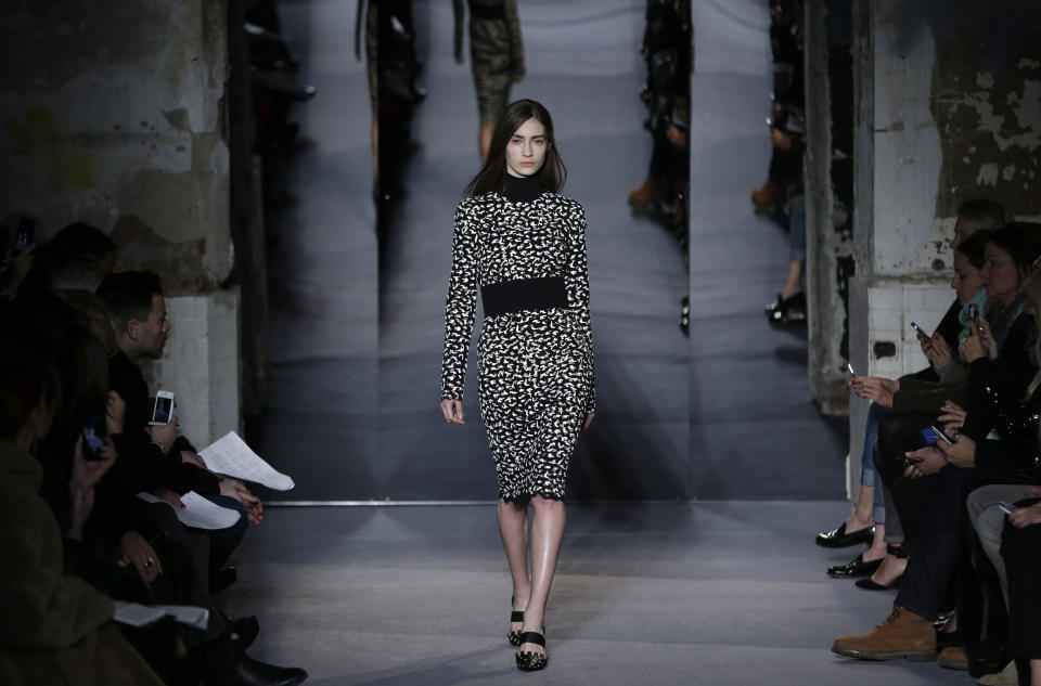 The Proenza Schouler Fall 2013 collection is modeled during Fashion Week in New York, Wednesday, Feb. 13, 2013. (AP Photo/Seth Wenig)