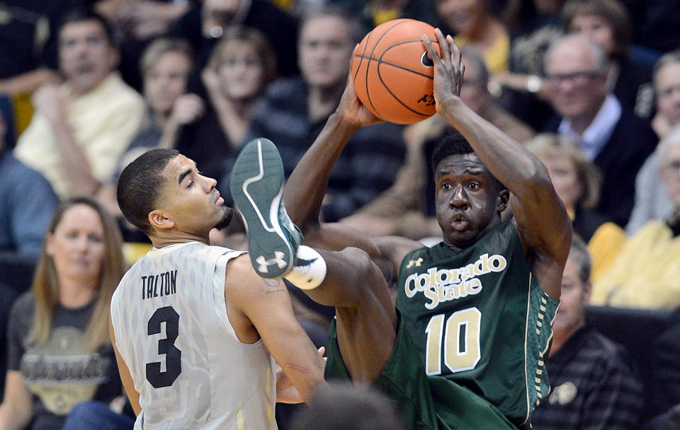 Colorado State&#39;s Joe De Ciman,(10) intercepts a pass meant for Colorado&#39;s Xavier Talton, left, during the second half of an NCAA college basketball game, Wednesday, Dec. 10, 2014 in Boulder, Colo. (AP Photo/The Daily Camera, Cliff Grassmick)