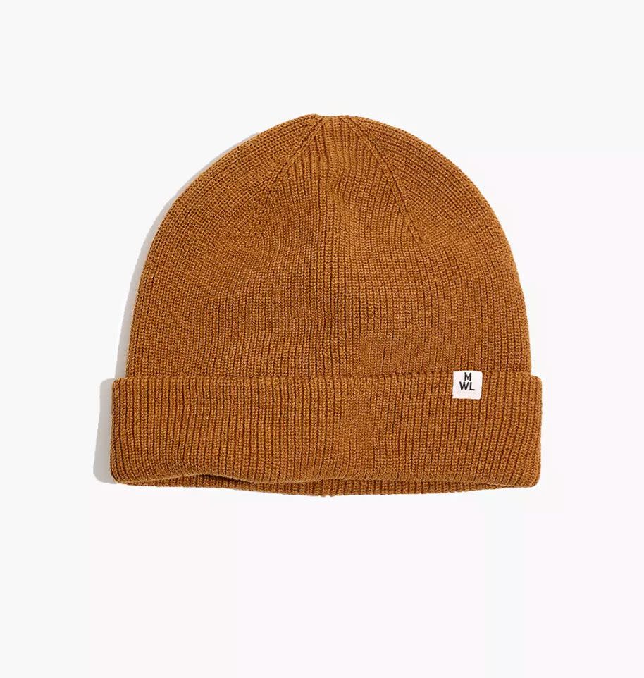 Upgrade his outfits with this versatile spice-colored beanie. ﻿<a href="https://www.madewell.com/recycled-cotton-cuffed-beanie-MB616.html?dwvar_MB616_color=BR6283&amp;cgid=men-accessories-hats#gridtype=four-up&amp;start=1" target="_blank" rel="noopener noreferrer">Get it for $35 at Madewell.</a>