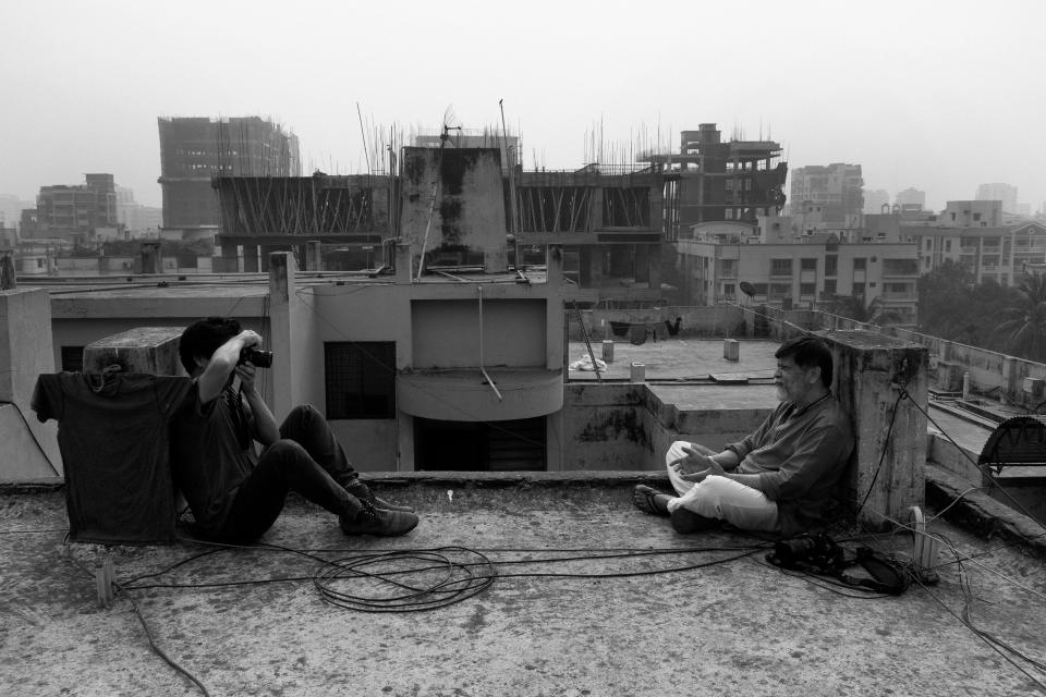 Photographer Moises Saman takes a portrait of Shahidul Alam for TIME's Person of the Year portfolio in Bangladesh on Dec. 5, 2018.