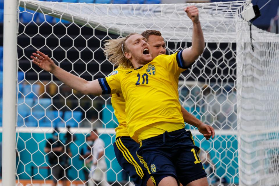 Emil Forsberg celebrates after scoring from the spot (AP)