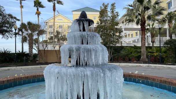 PHOTO: Ice adorns a fountain in Charleston, South Carolina, on December 24, 2022, where temperatures are forecast to reach a high of 32F. (Pedro Ugarte/AFP via Getty Images)
