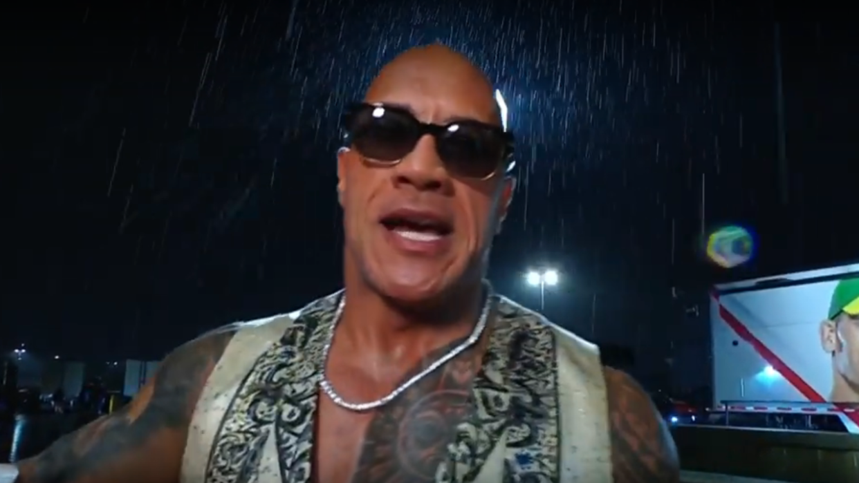  The Rock addresses the camera after fighting Cody Rhodes in the parking lot. 