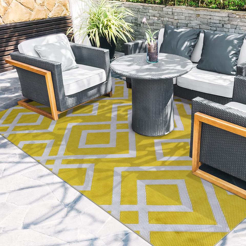 iCustomRug Outdoor Rug in Diamond Yellow. Image via Amazon. 