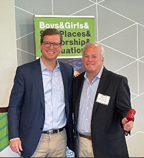 Tom M. Kirchoff (right) was recently named the new chairman of the PBC Boys & Girls Club board of directors. He replaced outgoing chairman Robert B. Duncan II (left).