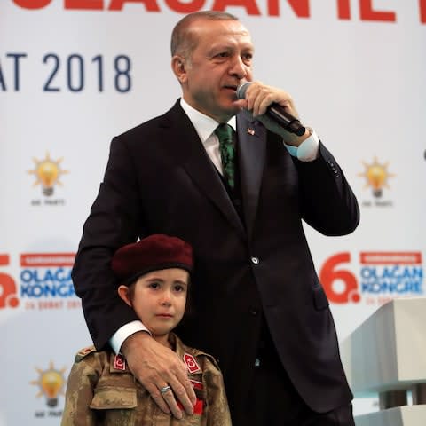 Mr Erdogan invited the girl on stage during a televised meeting with his Islamist-rooted Justice and Development Party (AK Party) on Saturday - Credit: Anadolu