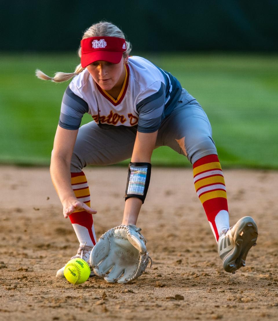 Mater Dei’s Claire Wagner (1) scoops the ground ball to throw to first as the Wildcats play the North Posey Vikings in the 2023 IHSAA 2A Girls’ Softball Sectional Championship at Forest Park High School in Ferdinand, Ind., Wednesday evening, May 24, 2023.