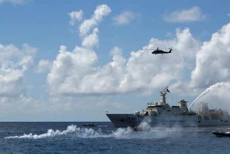 FILE PHOTO: A Taiwanese Coast Guard patrol ship, Kaohsiung (CG 129), is seen during a rescue drill near the coast of Itu Aba, which the Taiwanese call Taiping, at the South China Sea, November 29, 2016. REUTERS/J.R Wu