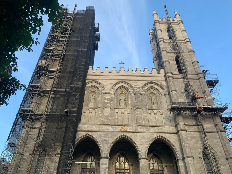 upward shot of Notre dame church in montreal