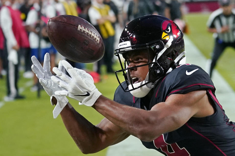 Arizona Cardinals wide receiver Rondale Moore (4) tries to pull in an incomplete pass in the endzone during the first half of an NFL football game against the New Orleans Saints, Thursday, Oct. 20, 2022, in Glendale, Ariz. (AP Photo/Matt York)