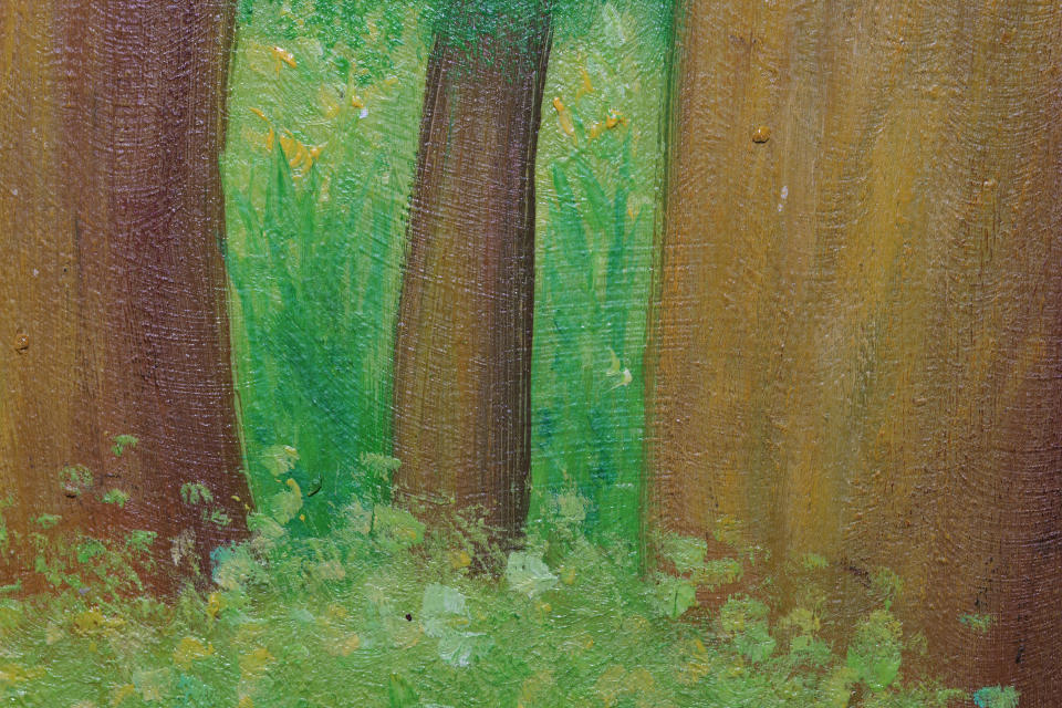 Close up of an oil painting of trees