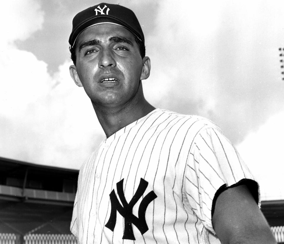 FILE - Joe Pepitone, baseball infielder for the New York Yankees, looks on in New York, March 4, 1964. Pepitone, a key figure on the 1960s Yankees who gained reknown for his flamboyant personality, has died at age 82. He was living with his daughter Cara Pepitone at her house in Kansas City, Mo., and was found dead Monday, March 13, 2023, according to BJ Pepitone, a son of the former player. (AP Photo/File)