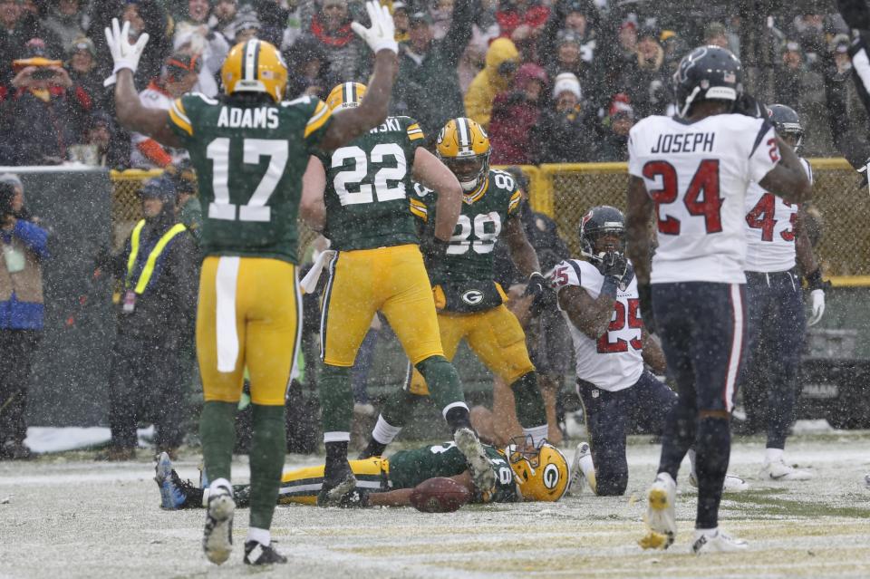 Randall Cobb went to the ground for a snow angel celebration but was not flagged. (AP)