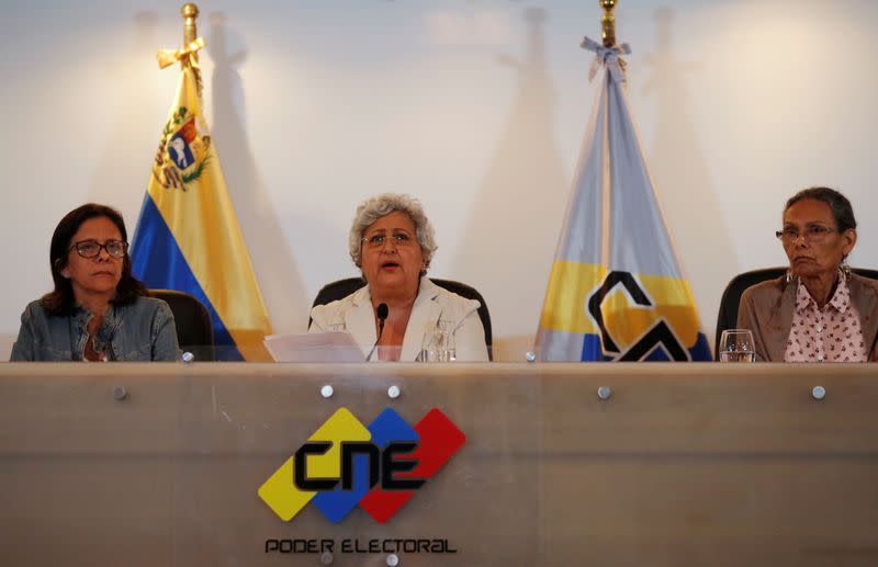 Venezuela's National Electoral Council (CNE) President Tibisay Lucena speaks during a news conference in CaracasVenezuela's National Electoral Council (CNE) President Tibisay Lucena (C) speaks next to rectors Sandra Oblitas and Socorro Hernandez during a n