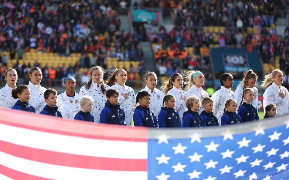 US players during anthems before their match against the Netherlands - US women&#39;s team refuse to sing national anthem before World Cup draw with Netherlands