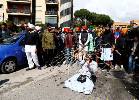 FILE PHOTO: A Sikh migrant performs at the celebrations at the Vaisakhi Festival, marking the New Year, in Rome, Italy April 14, 2019. REUTERS/Yara Nardi