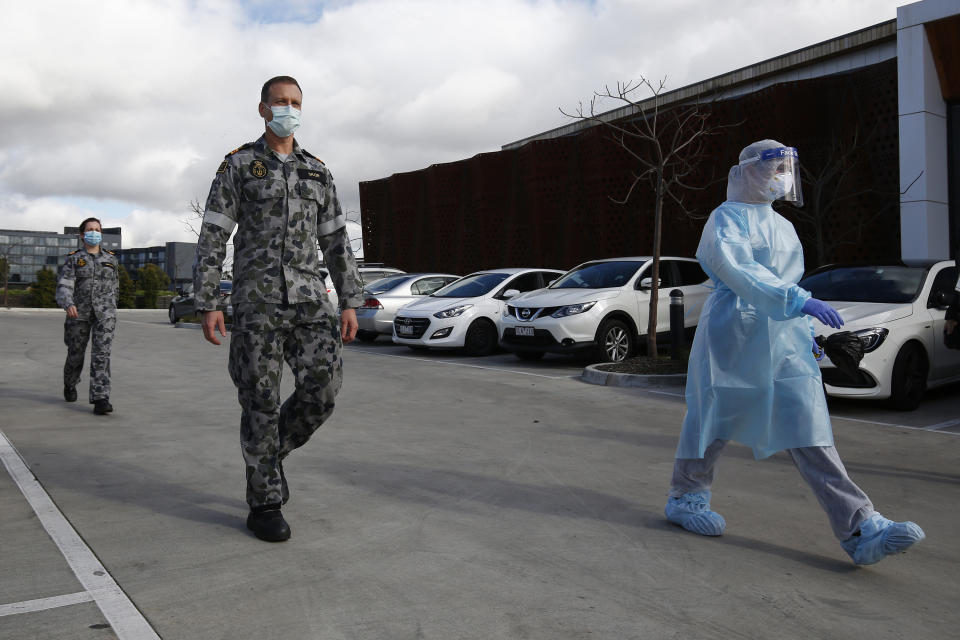 ADF staff arrive at Epping Gardens Aged Care Facility as the state's coronavirus crisis rolls on. Source: AAP