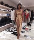 Kim's closet is possibly the most well-known area in their home, as she often posts pictures of her fittings that happen there. In one, in which she sports a gold cutout dress, racks of clothes and streamlined shelves of shoes and purses are visible behind her. 