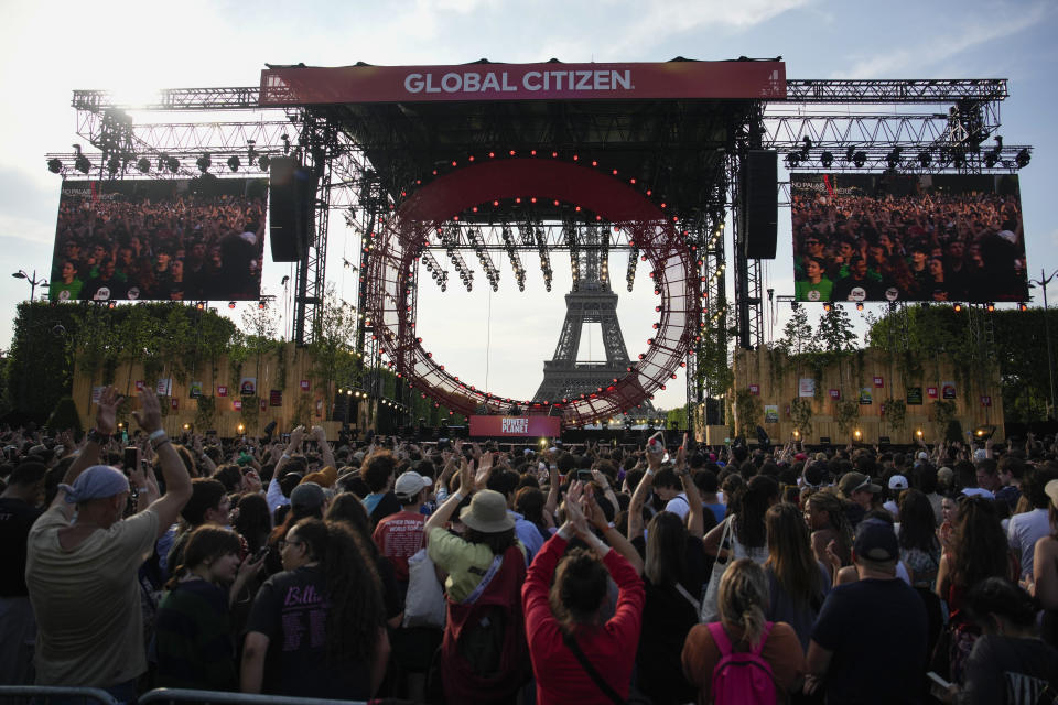 Mosimann performs during the Power Our Planet concert on the sideline of the Climate Finance conference in Paris, Thursday, June 22, 2023. World leaders, heads of international organisations and activists are gathering in Paris for a two-day summit aimed at seeking better responses to tackle poverty and climate change issues by reshaping the global financial system. (AP Photo/Lewis Joly)