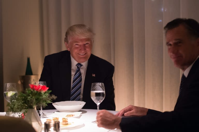 US President-elect Donald Trump (L) dines with Mitt Romny (R) at Jean-Georges restaurant at Trump International Hotel and Tower, Tuesday, November 29, 2016