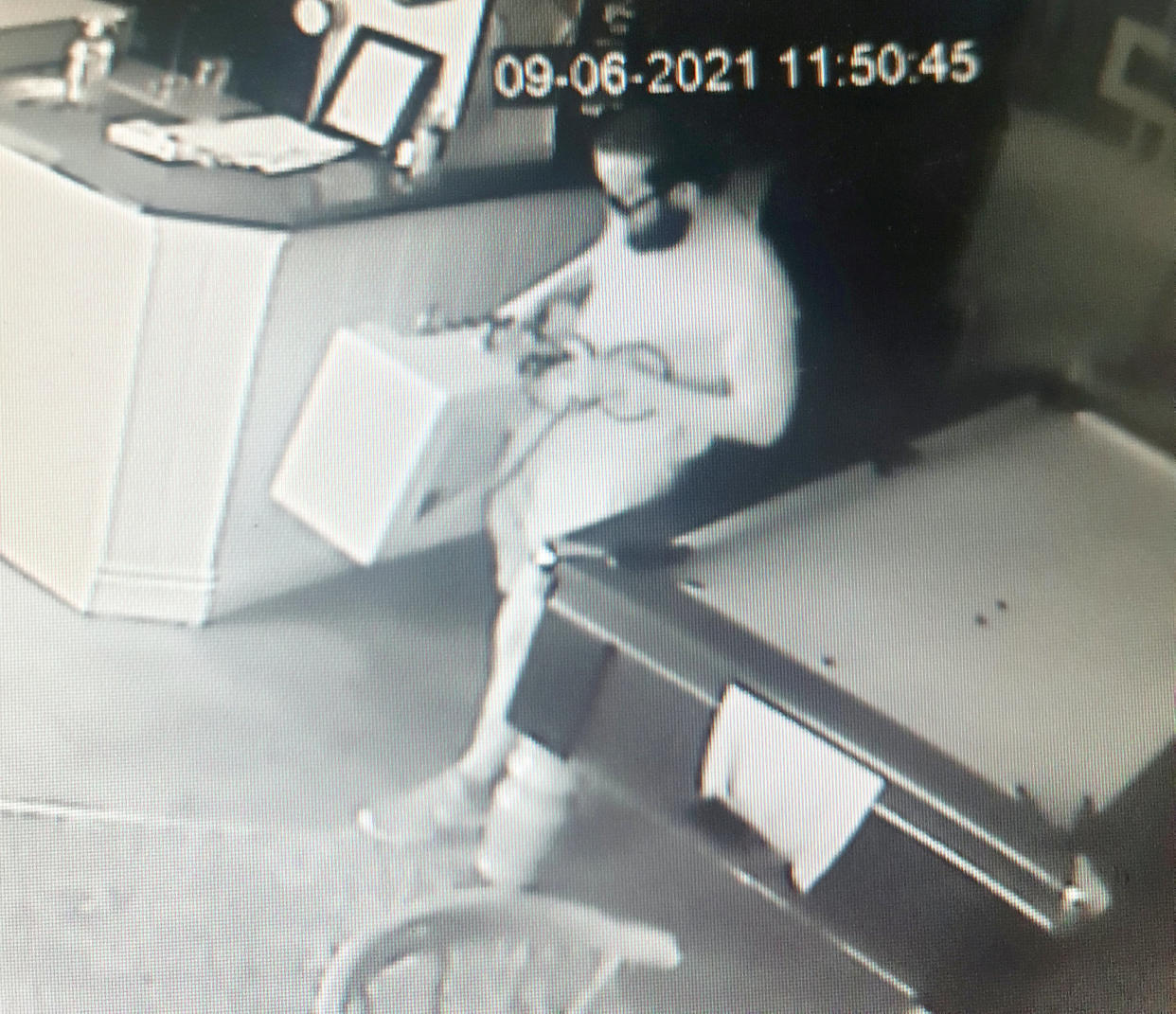 **EMBARGOED UNTIL 2PM BST / JULY 1, 2021**

CCTV of burglar in the pub and removing guitar and other goods to his car outside.  A brazen thief caught on camera stealing £5,000 worth of gear in Dover couldn't be nicked because he had left England by going through customs and was waiting for a ferry to France.  See SWNS story SWNNburglar.  The Italian committed the 'perfect crime' by raiding a pub and driving into a Channel ferry port - a few hundred yards away.  Once there, he couldn't be arrested - by Dover cops or the gendarme - despite being pointed out by the enraged victim.  He was deemed to be on French soil - while the burglary had been committed on British soil.  The bearded suspect, a 31 year old called Luca is understood to have arrived safely home in Italy.  Publican Jemima Burne, 29, was tipped off about the daylight raid by builders working at the Castle Inn.  He timed it to coincide with his hasty departure. He calmly strolled into the bar helping himself to a rare guitar, an amp and a variety of other goods.  He was caught on CCTV around 1pm on June 9 loading his swag into a dark blue Peugeot - and made off. But furious Jemima tracked him down - into the nearby terminal. 