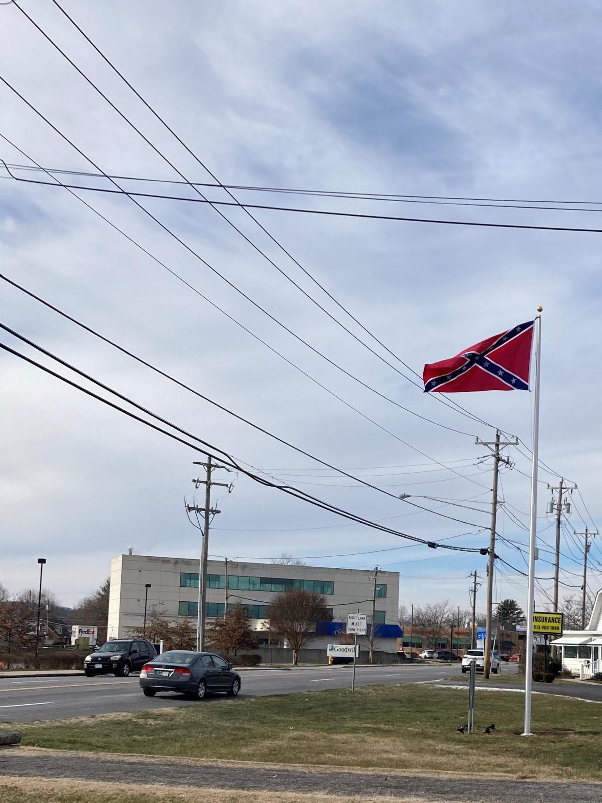 A Confederate flaps on private property along Harrison Avenue, to the chagrin of many in the city of Harrison, Ohio.