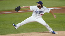 Los Angeles Dodgers starting pitcher Clayton Kershaw delivers during the first inning in Game 2 of a baseball National League Division Series Wednesday, Oct. 7, 2020, in Arlington, Texas. (AP Photo/Sue Ogrocki)