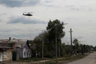 Russian Ka-52 "Alligator" attack helicopter flies in Popasna