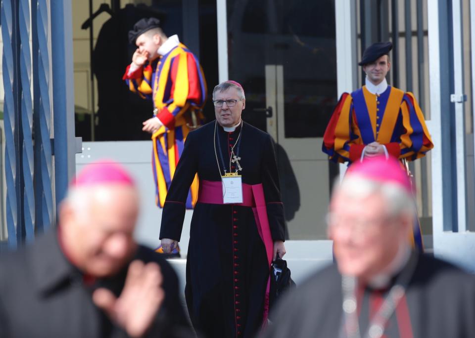 Copenhagen's Bishop Czesław Kozon, center, leaves from the Sant'Uffizio gate to the Vatican, Thursday, Feb. 21, 2019, during a four-day sex abuse summit called by Pope Francis. The gathering of church leaders from around the globe is taking place amid intense scrutiny of the Catholic Church's record after new allegations of abuse and cover-up last year sparked a credibility crisis for the hierarchy. (AP Photo/Domenico Stinellis)