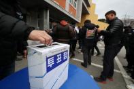 Striking truckers vote on whether to end their strike in Gwangju