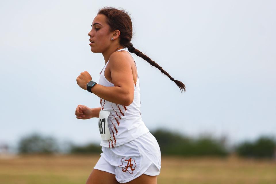 Alice's Victoria Diaz (887) competes in the UIL Region IV Cross Country Championships at Dr. Jack Dugan Family Soccer and Track Stadium in Corpus Christi, Texas on Monday, Oct. 24, 2022. Diaz placed seventh in the 4A girls race with a time of 12:11.18.