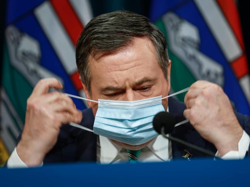 Alberta Premier Jason Kenney blames AHS for providing what he says was fluctuating information about intensive care capacity during the COVID-19 pandemic. (Jeff McIntosh/The Canadian Press - image credit)