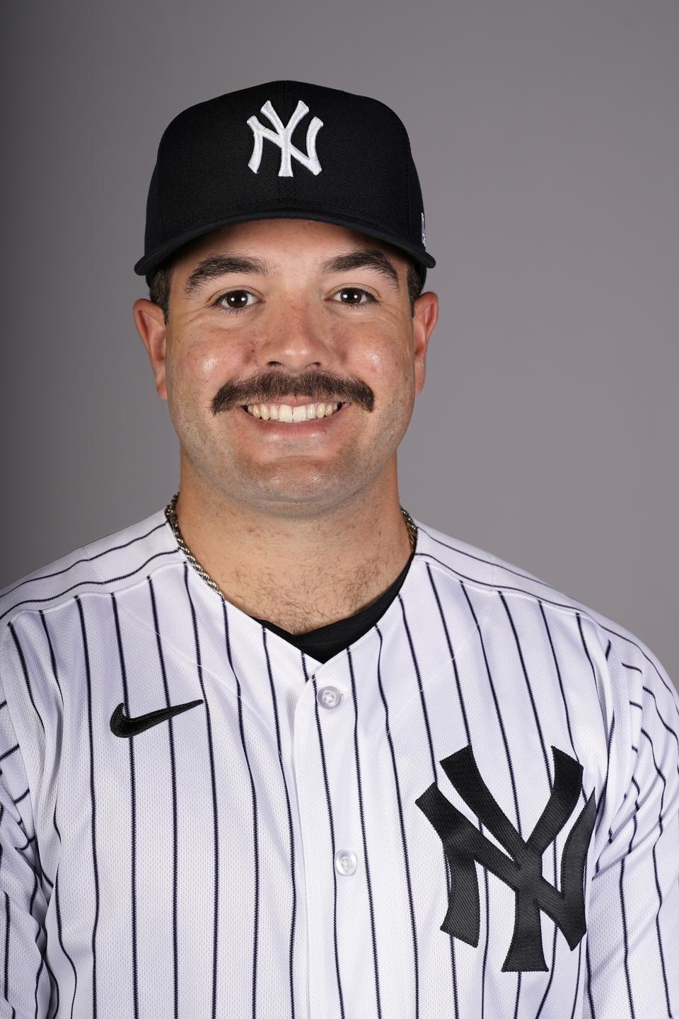 FILE - Austin Wells of the New York Yankees poses for a photo during baseball spring training Feb. 22, 2023, in Tampa, Fla. Yankees owner Hal Steinbrenner said he's excited to see what an influx of young players will bring to the major league team over the final weeks of a lost season. The Yankees plan to call up top prospects Jasson Domínguez and Wells on Friday, Sept. 1, when active major league rosters expand from 26 to 28. (AP Photo/David J. Phillip, File)