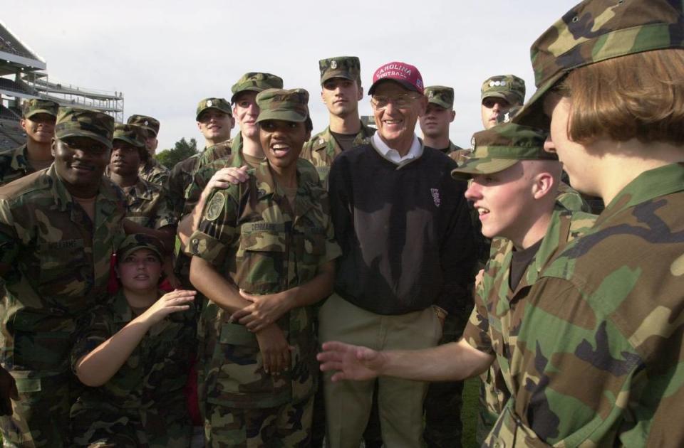 Sept. 20, 2001: USC head coach Lou Holtz offers words of encouragement before the start of the game.