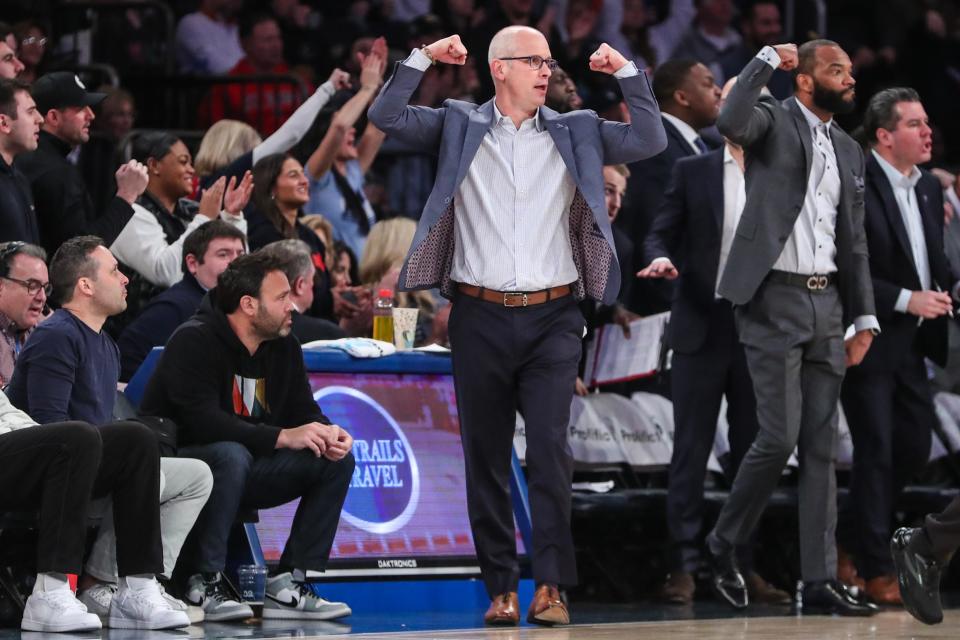 Connecticut Huskies head coach Dan Hurley celebrates beating St. John's in the Big East Tournament. Hurley and his staff used to coach the University of Rhode Island men's team.