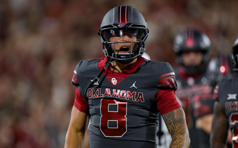 Nov 11, 2023; Norman, Oklahoma, USA; Oklahoma Sooners quarterback Dillon Gabriel (8) reacts after scoring a touchdown during the first quarter against the West Virginia Mountaineers at Gaylord Family-Oklahoma Memorial Stadium. Kevin Jairaj-USA TODAY Sports