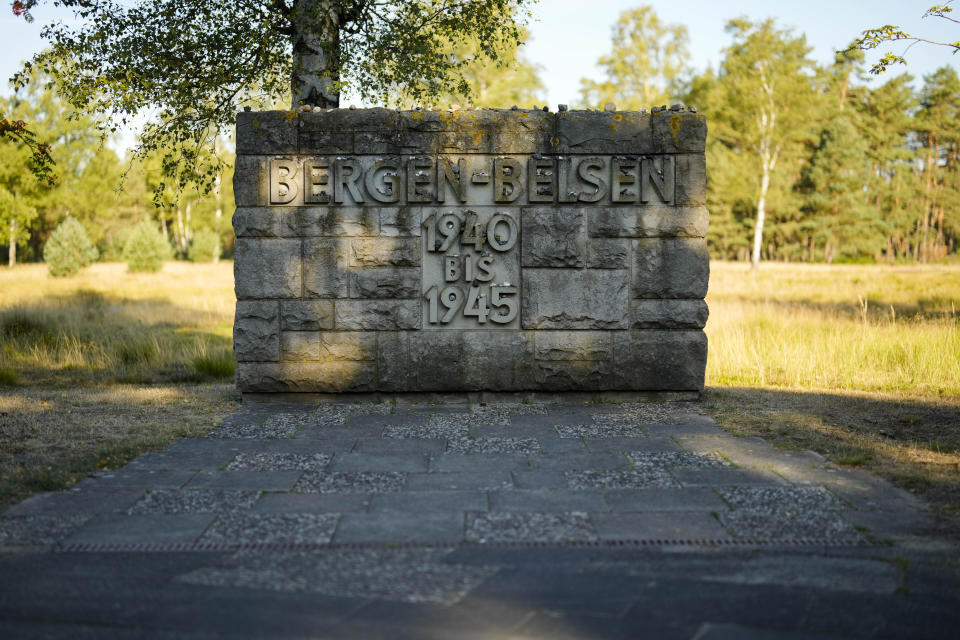 A view of a memorial stone at the former Nazi concentration camp Bergen-Belsen in Bergen, Germany, Saturday, Sept. 3, 2022. Shaul Ladany survived a Nazi concentration camp and narrowly escaped the massacre of the Israeli athletes at the 1972 Olympic Games in Munich. Both attempts to murder him happened on German soil in the last century. Many decades later, the 86-year-year old Jew has returned to visit the two places where he narrowly escaped death. (AP Photo/Markus Schreiber)