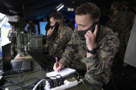 U.S. Marines soldiers take part in a joint military drill between Japan Self-Defense Force, French army and U.S. Marines, at the Kirishima exercise area in Ebino, Miyazaki prefecture, southern Japan Saturday, May 15, 2021. (Charly Triballeau/Pool Photo via AP)