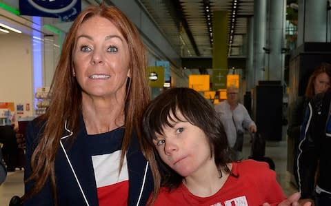 Charlotte Caldwell, with her 12 year son Billy at Heathrow Airport after arriving from Canada. Billy suffers from an extreme form of epilepsy, both he and Charlotte went to Canada to get access to a drug called canabis oil with is not available on the NHS and is deemed illgal in the UK. Charlotte had a six month supply of the medication but was confiscated by customs at Heathrow. picture David Dyson - Credit: David Dyson