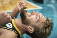 Indiana Pacers forward Domantas Sabonis reacts after missing a shot in the final seconds against the Charlotte Hornets during an NBA basketball game in Charlotte, N.C., Wednesday, Oct. 20, 2021. (AP Photo/Jacob Kupferman)