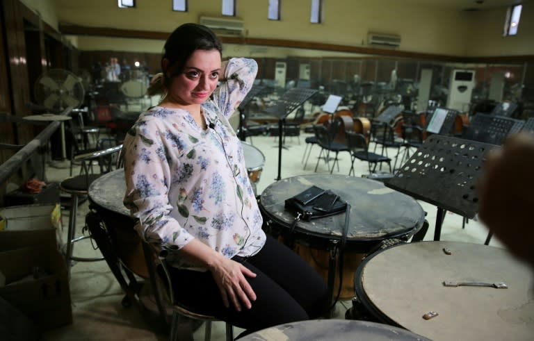 Ezzat's daughter Noor, a timpanist in the orchestra, is going without pay as well as her two brothers. "As long as we live, music will live. It's our culture," she says